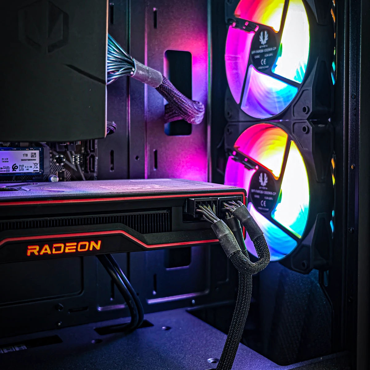 Custom PC build featuring a Radeon graphics card and RGB cooling fans